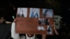 Pankartë gjatë protestës më 1 dhjetor 2022, pas vrasjes së Hamide Magashit në oborrin e Klinikës së Gjinekologjisë në QKUK.