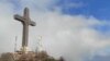 Поглед на Скопје од врвот на Водно и крстот на Водно во магла 