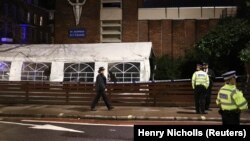 Полиция на месте происшествия, Лондон, 14 января 2023 года