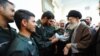 Supreme Leader Ayatollah Ali Khamenei meets with the IRGC members involved in the arrest of U.S. sailors in the Persian Gulf in January 2016.