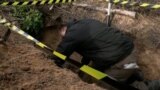 Ukraine, Donetsk, volunteers exhume the bodies of fallen soldiers on the front line