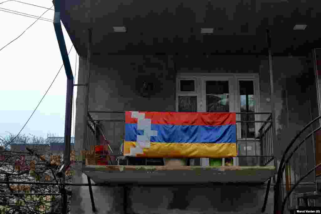 The flag of Nagorno-Karabakh seen on a house in Stepanakert. Armenia and Azerbaijan have been fighting over Nagorno-Karabakh since Armenia-backed separatists captured the mountainous territory, populated by ethnic Armenians, in the 1990s. Nagorno-Karabakh today is internationally recognized as part of Azerbaijan. &nbsp;