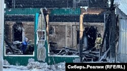 Kemerowada ýangynda harap bolan garrylar öýi. 24-nji dekabr, 2022.