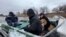 Coast of river Dnjepar: evacuation of Ukrainians by boat