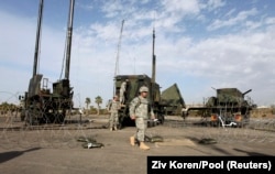 U.S. Army officers man a Patriot anti-missile battery site.