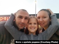Анна Соколова з батьками
