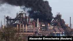 Smoke rises above the Azovstal steel plant in the southern port city of Mariupol on April 25.