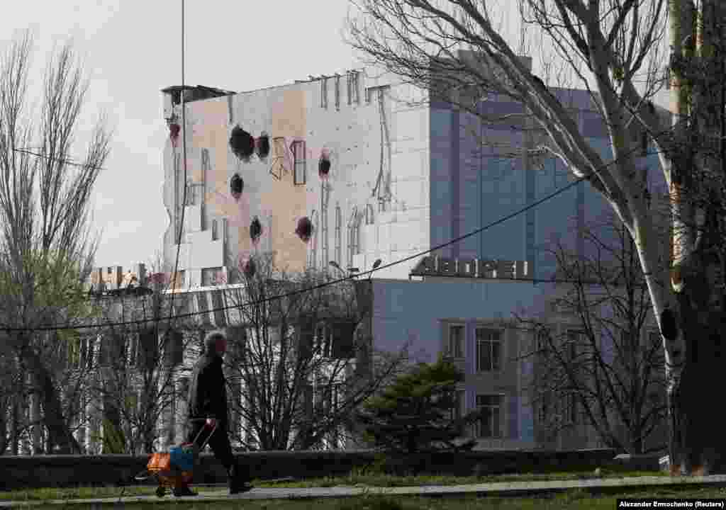 The war-damaged Palace of Culture in the ravaged southern port city of Mariupol. Ukraine&#39;s Ministry of Culture and Information Policy is asking citizens to submit photographic evidence of war damage that can be used as evidence for criminal proceedings against Russia.