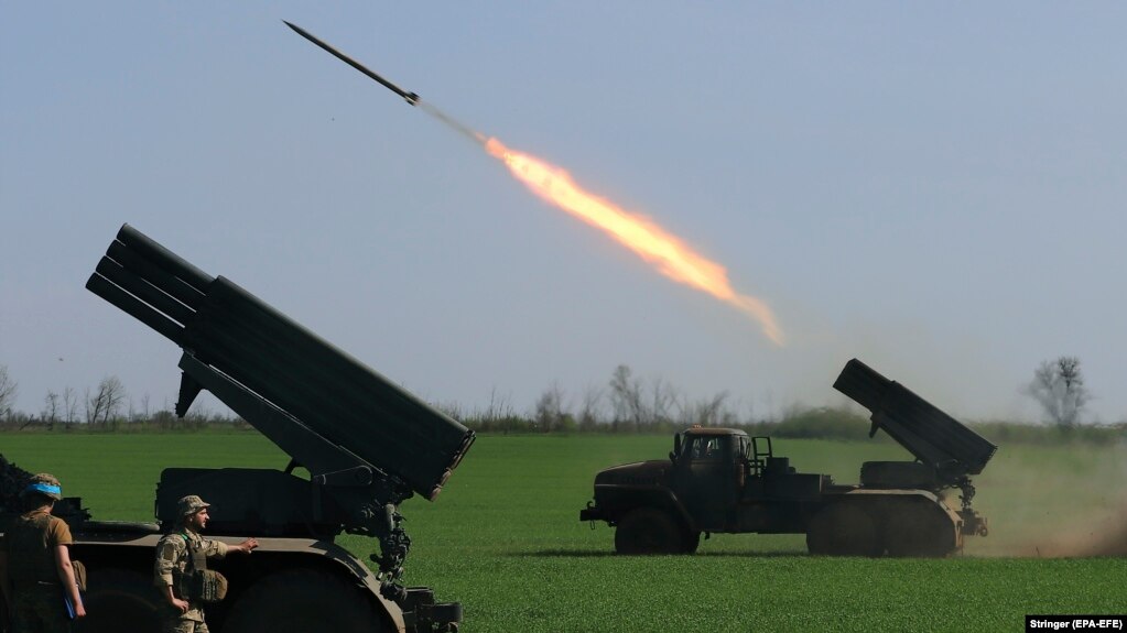 Ukrainian soldiers fire multiple rockets at Russian positions from a site near the city of Popasna, not far from Luhansk, on April 26.