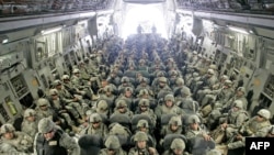 U.S. soldiers arrive at Manas from Afghanistan in February.