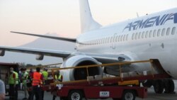 A cargo plane at Yerevan's Zvartnots airport being loaded with humanitarian supplies for Lebanon, August 8, 2020