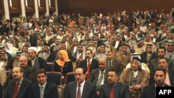 Politicians of the State of Law Coalition assemble in Baghdad.