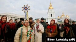 People celebrate Orthodox Christmas in central Kyiv on January 7.