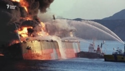 Киштӣ дар оташ, таҳдиди мушакҳои Эрон ва минаҳо