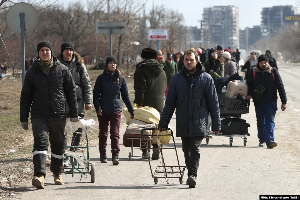 Citizens prepare for an attempt to evacuate the embattled city of Mariupol on foot on March 20, 2022.