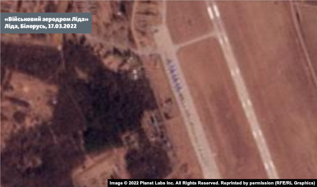 A long line of planes identified as Su-34 bombers at the Lida Military Airfield in Belarus on March 17.