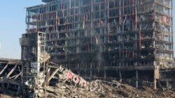 Kiyevdə ticarət mərkəzinə raket zərbəsi