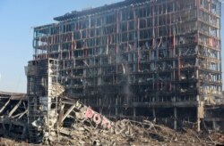 Granatirani trgovački centar u kijevskom okrugu Podilskii, 21. mart 2022.