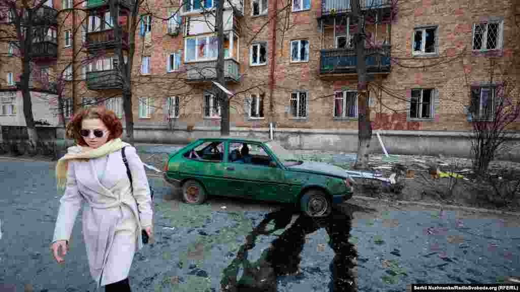 A car riddled with shrapnel and leaking fluid after a rocket attack on the&nbsp;Shevchenko district of Kyiv on March 23.&nbsp;