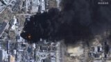 UKRAINE – Satellite view of burning oil storage tanks in the industrial area of Chernihiv, as Russia's invasion of Ukraine continues, March 21, 2022