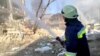 Russian Missile Fragments Set Houses On Fire In Kyiv GRAB 1