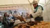 Cooking traditional Kazakh pilaf in Almaty.