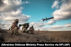 Ukrainian soldiers fire U.S.-supplied Javelin missiles during military exercises in December 2021.