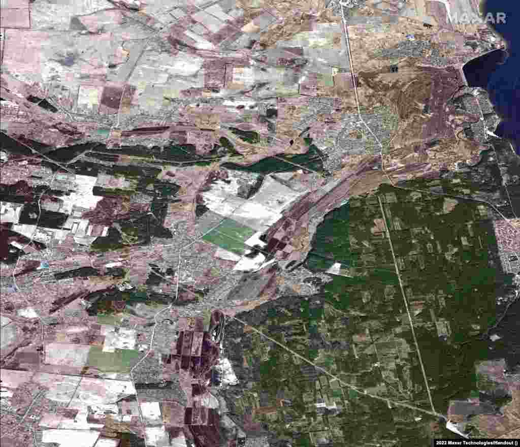 This satellite image shows fields in the Irpin River basin northwest of Kyiv before flooding.