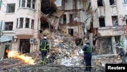 Apartments destroyed by Russian shelling in central Kharkiv.