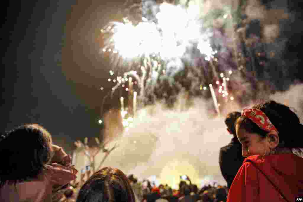 Fireworks light up the sky during a Norouz ceremony at the Iran Mall shopping center in Tehran.