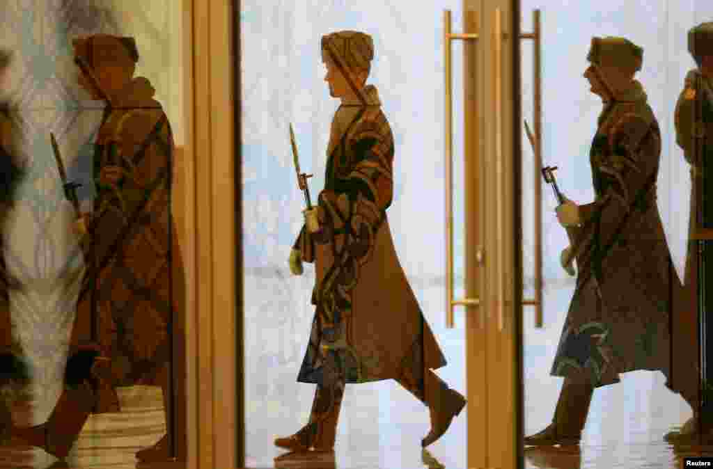 Members of an honor guard arrive at the Palace of Independence before a meeting of Belarusian President Aleksandr Lukashenka and Turkish President Recep Tayyip Erdogan in Minsk. (Reuters/Vasily Fedosenko)