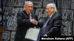 رئوون ریولین، رئیس‌جمهوری اسرائیل، (راست) همراه با بنیامین نتانیاهو