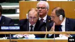 U.S. -- Russian President Vladimir Putin (L) sits with Russiann Foreign Minister Sergei Lavrov (R), during the 70th session General Debate of the United Nations General Assembly at UN headquarters in New York, September 28, 2015