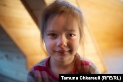 Seven-year-old Myroslava is already learning Polish in school and in their new home.
