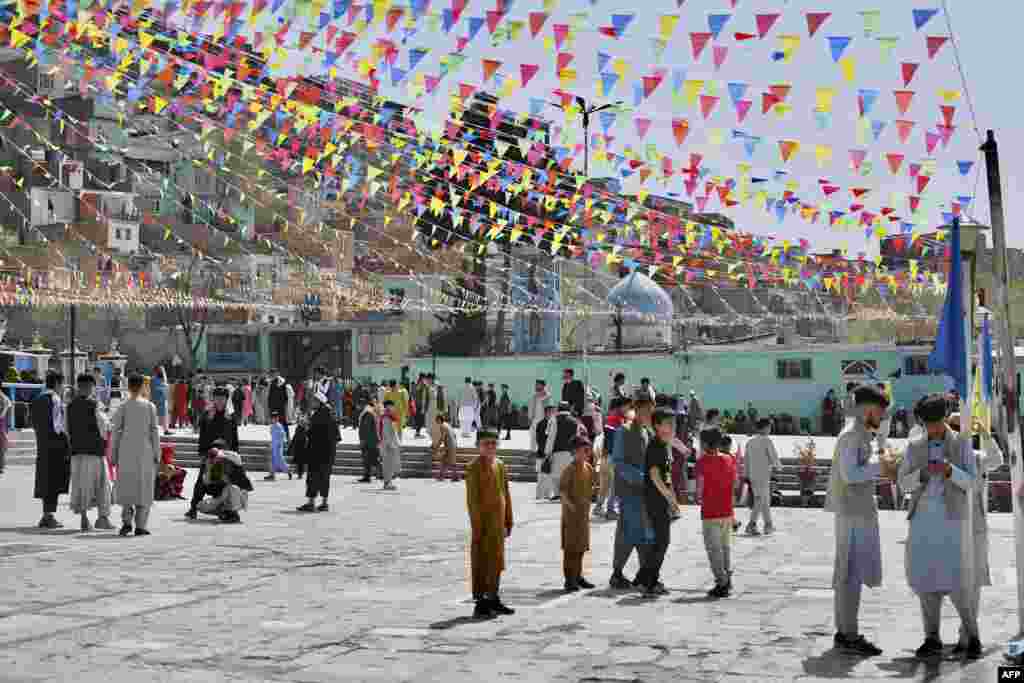 People gather in front of the Karte Sakhi shrine on the first day of Norouz in Kabul.