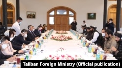 Chinese Foreign Minister Wang Yi and his delegation meet with Taliban officials in Kabul on March 24.