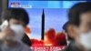 Snimak na televiziji ispaljivanja severnokorejske rakete, Seul, 24. mart 2022.