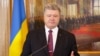 Poroshenko Accuses Moscow Of 'World Hybrid War,' Denounces 'Russian World'