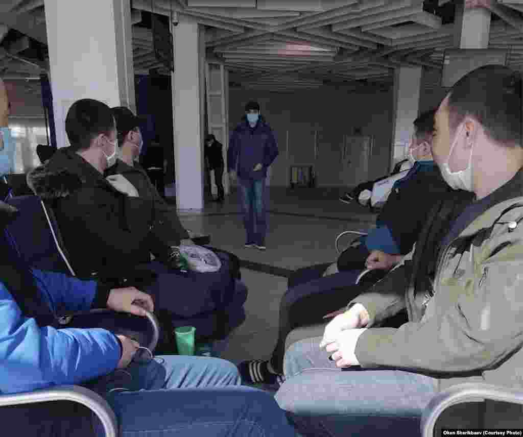 Kyrgyz migrants at Tolmachevo Airport in Novosibirsk say they lost their jobs and their apartments. They are living in limbo and are desperate for help from the Kyrgyz government.