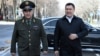 Kyrgyz President Sadyr Japarov (right) and national-security chief Kamchybek Tashiev (file photo)