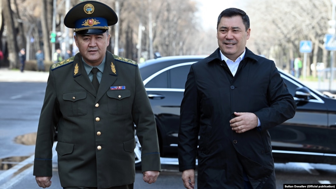 Kyrgyz President Sadyr Japarov (right) and national-security chief Kamchybek Tashiev (file photo)