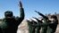 Россия. Бурятия. Военнослужащие во время прощания с 24-летним старшим лейтенантом Цыреном Балдановым на кладбище в селе Усть-Кяхта.  Александр Гармаев/ТАСС