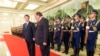 FILE: Pakistani President Mamnoon Hussain (C) attends a welcoming ceremony with Chinese President Xi Jinping (L) in Beijing (February 19, 2014).