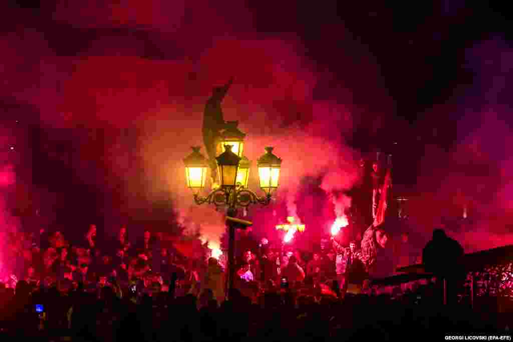 Soccer fans in Skopje celebrate North Macedonia&#39;s shock victory over Italy in a World Cup qualifying playoff on March 24.&nbsp;