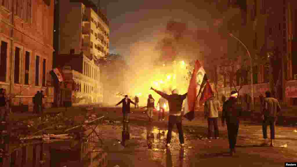 Protesters in Cairo chant antigovernment slogans during a rally condemning the deaths of 74 soccer fans at Port Said stadium. (REUTERS/Asmaa Waguih)