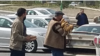 Turkmenistan. Man with hands full of bread. March, 2022