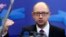 Украина премьер-министрі Арсений Яценюк Еуропа Одағы елдері басшылары саммитінде сөйлеп тұр. Брюссель, 21 наурыз 2014 жыл.