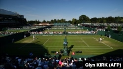 The ban meant that players such as top-ranked male Daniil Medvedev and two-time major champion Victoria Azarenka would not be allowed to compete in this year's tennis championship at Wimbledon.