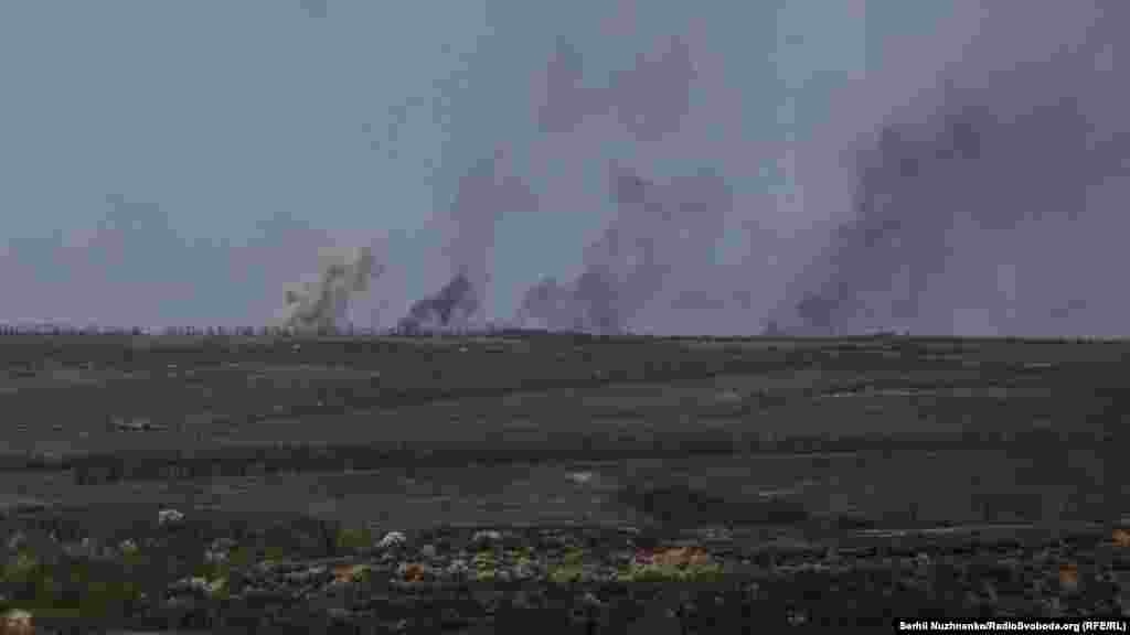 Plumes of smoke rise above the landscape of the Luhansk region after shelling on April 26.&nbsp;&nbsp;