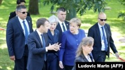 Emmanuel Macron Theresa May i Angela Merkel na summitu EU -Zapadni Balkan u Sofiji 17. maja 2018.